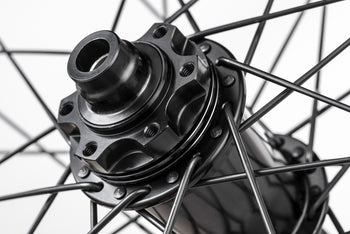 <h1>Front Hub</h1><i>We have gone all out on the front hub and beefed it up over standard Enduro wheelsets. These hubs have been selected based on their ability to perform on the most aggressive trails with oversized 17mm 7075-T6 axles for increased stiffness and Heatsinks built into the 6-bolt rotor mount helps to dissipate heat away from the hub and brake system.</i>