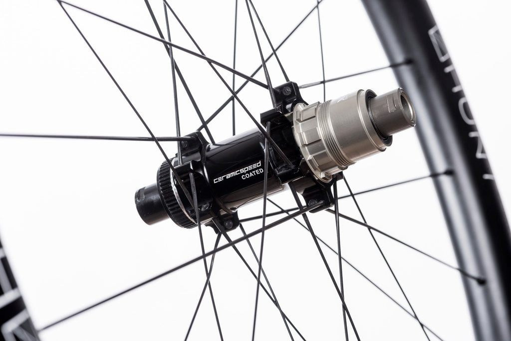 Detailed image of the 54 UD Carbon Spoke Disc rear hub, featuring CeramicSpeed bearings